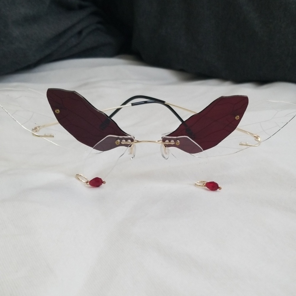 **NEW NEVER WORN MOTH GLASSES**